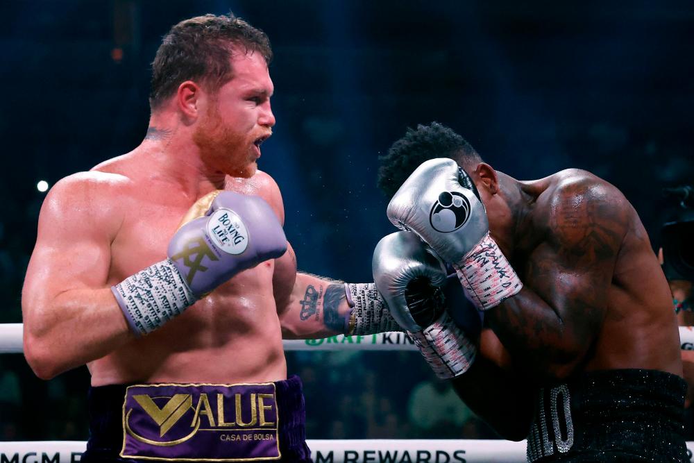 Canelo Alvarez Dominates Jermell Charlo to Retain Undisputed Title