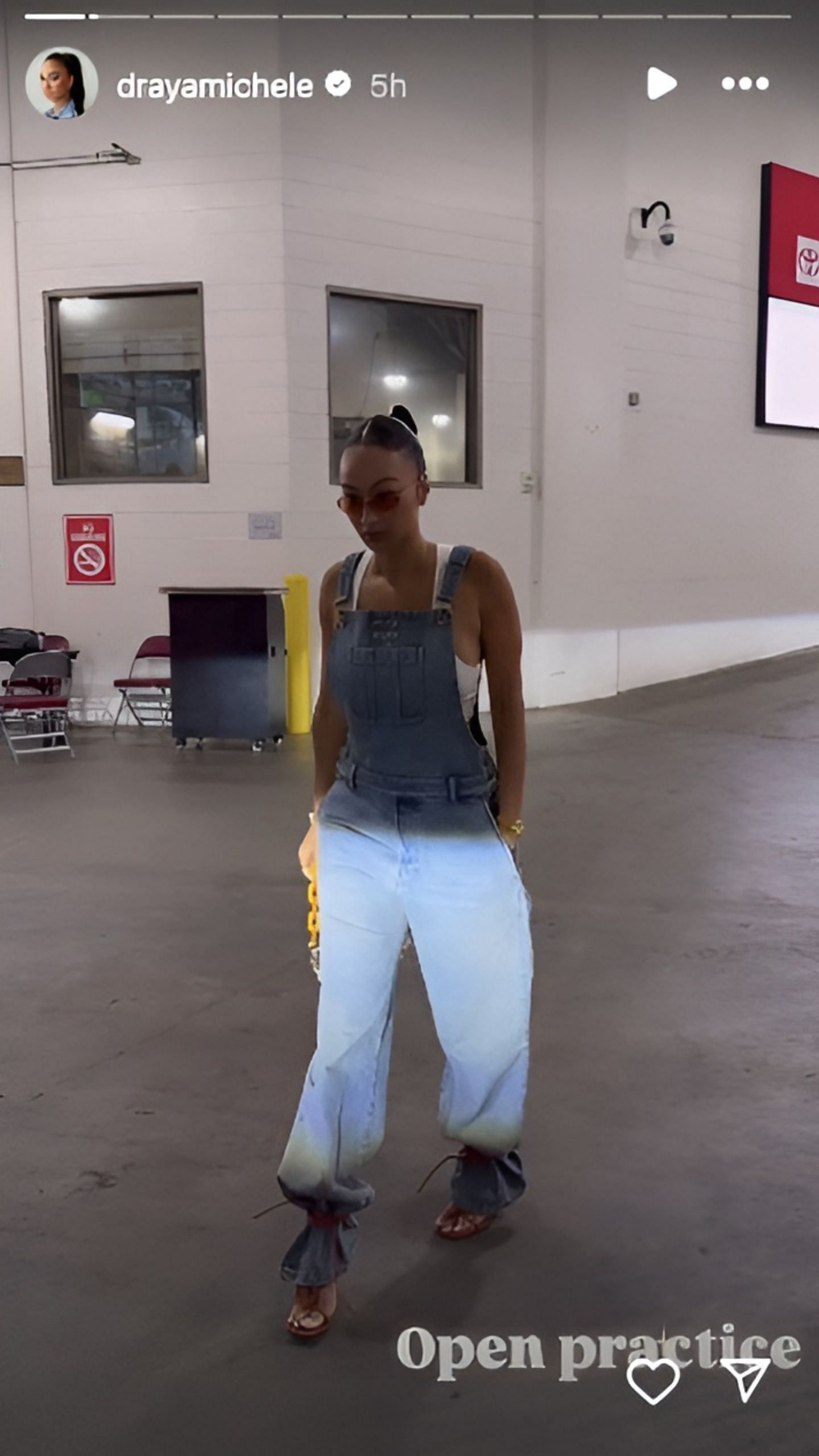 Draya Michele Rocks Stylish Overalls at the Rockets Preseason Game