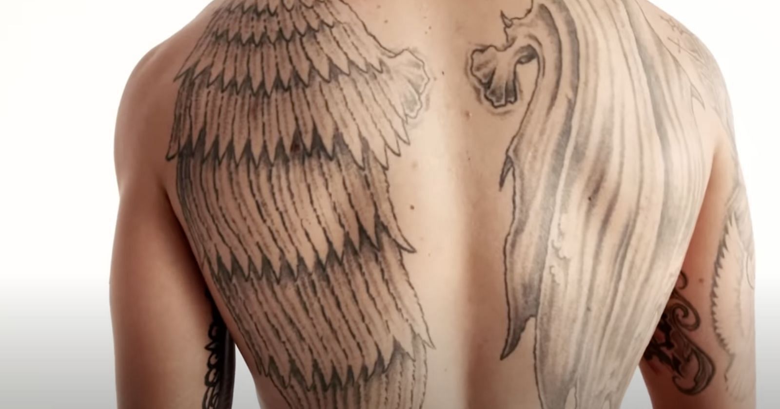 Max Holloway Back Tattoo: What Is the Design and Its Meaning?